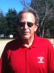 Coach Stanley Winston poses for photo